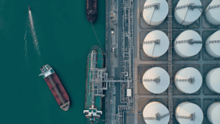 Shipping tanker at oil tank dock