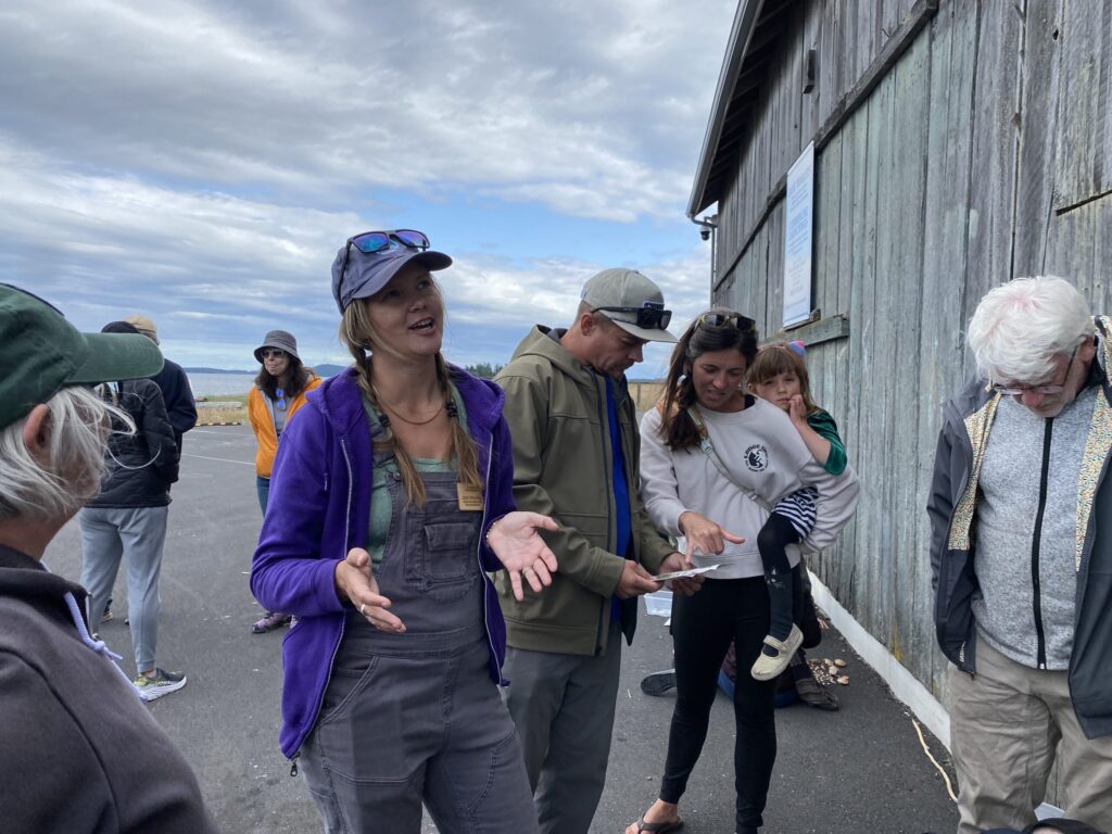 jess newley talking to a group of people