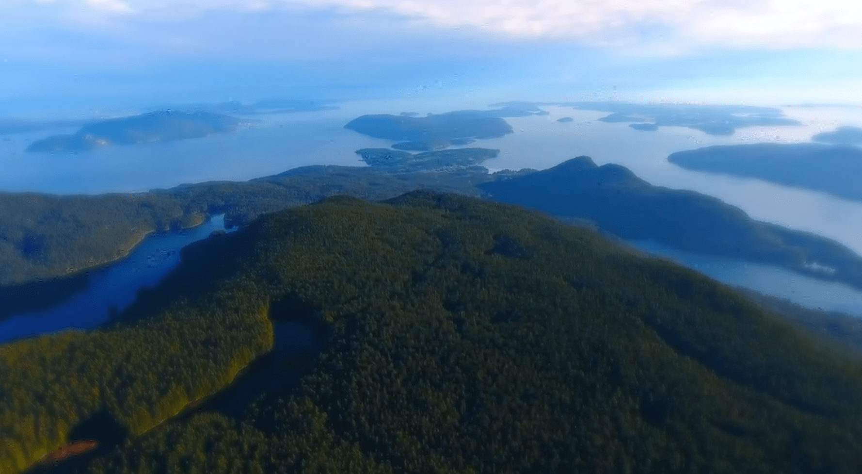 aerial view of the san juan islands scattered across the pacific ocean