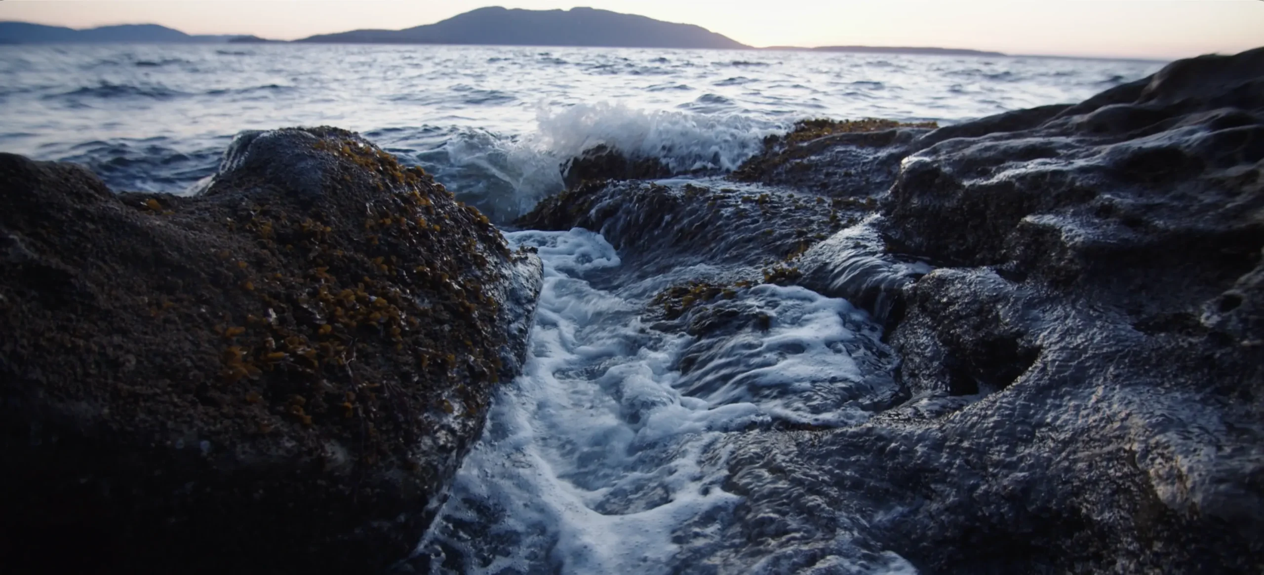 waves crashing on a rocky beach